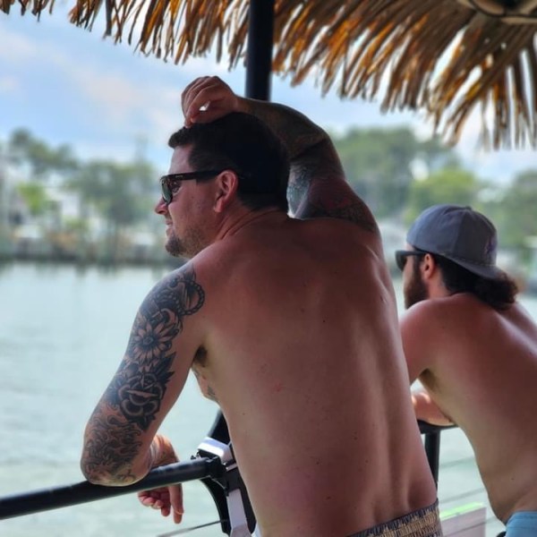 a person riding on the back of a boat